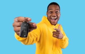 A person showing off the keys to their new car near Carmel, Indiana