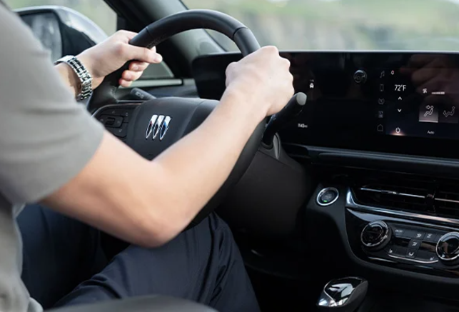 A person driving their new 2025 Buick Envista near Carmel, Indiana