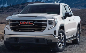 A white 2025 GMC Sierra 1500 parked on a gravel surface near Carmel, Indiana
