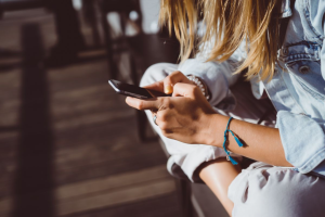 A person researching a 2025 GMC HUMMER EV Pickup near Carmel, Indiana