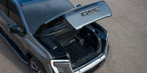 A grey 2025 Sierra EV with it's front compartment open near Carmel, Indiana